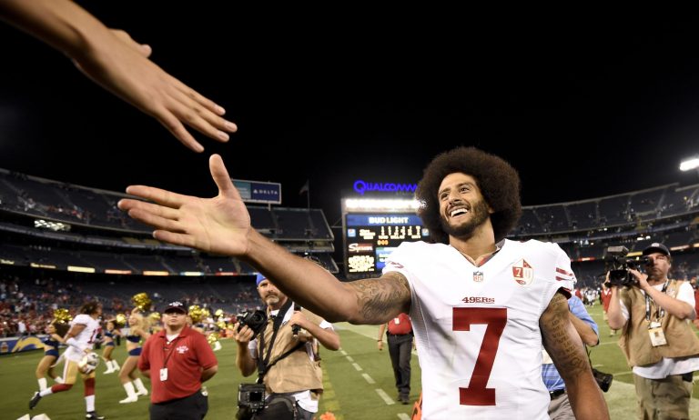 Two high-profile rappers, J. Cole and Trey Songz, performed Labor Day shows wearing Kaepernick's jersey. (AP Photo/Denis Poroy)