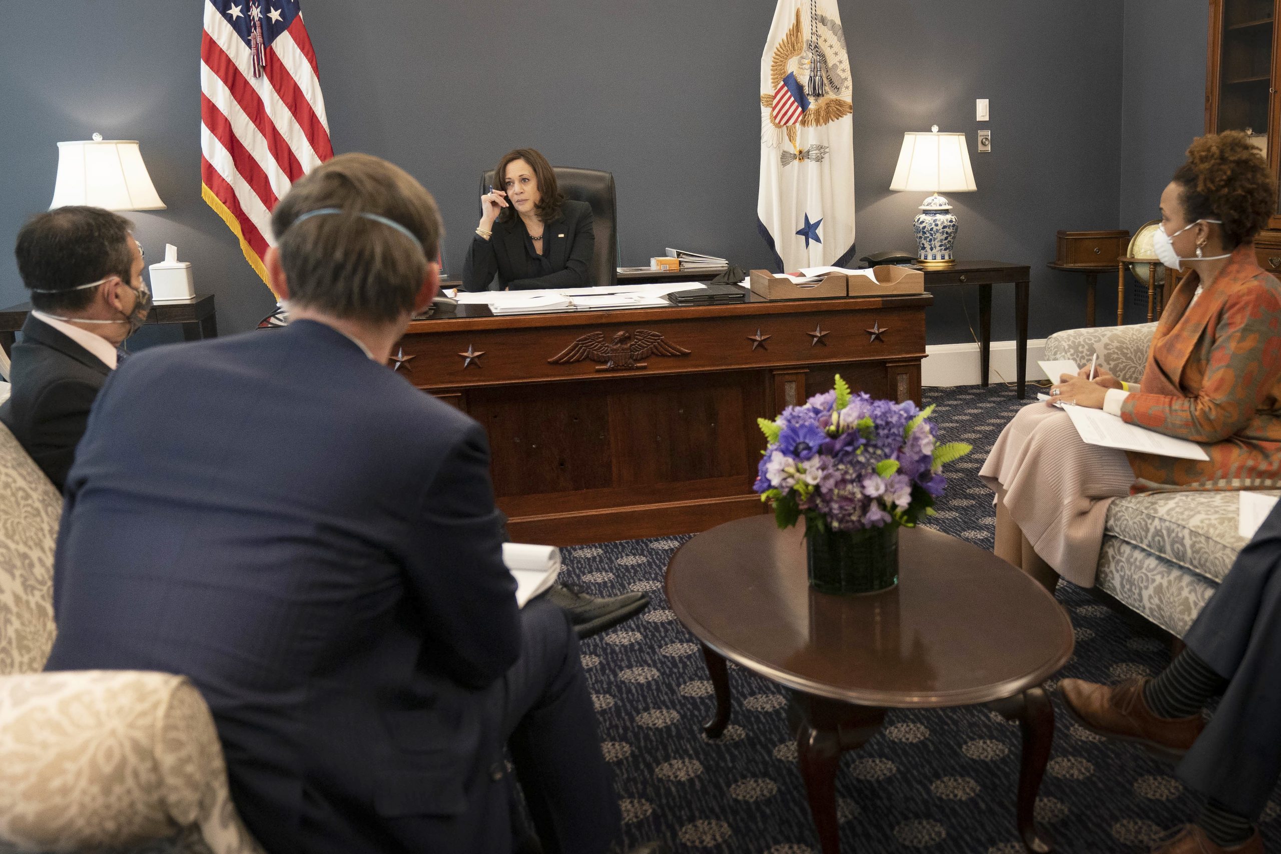 Vice President Kamala Harris conducts business at the USS Constitution desk