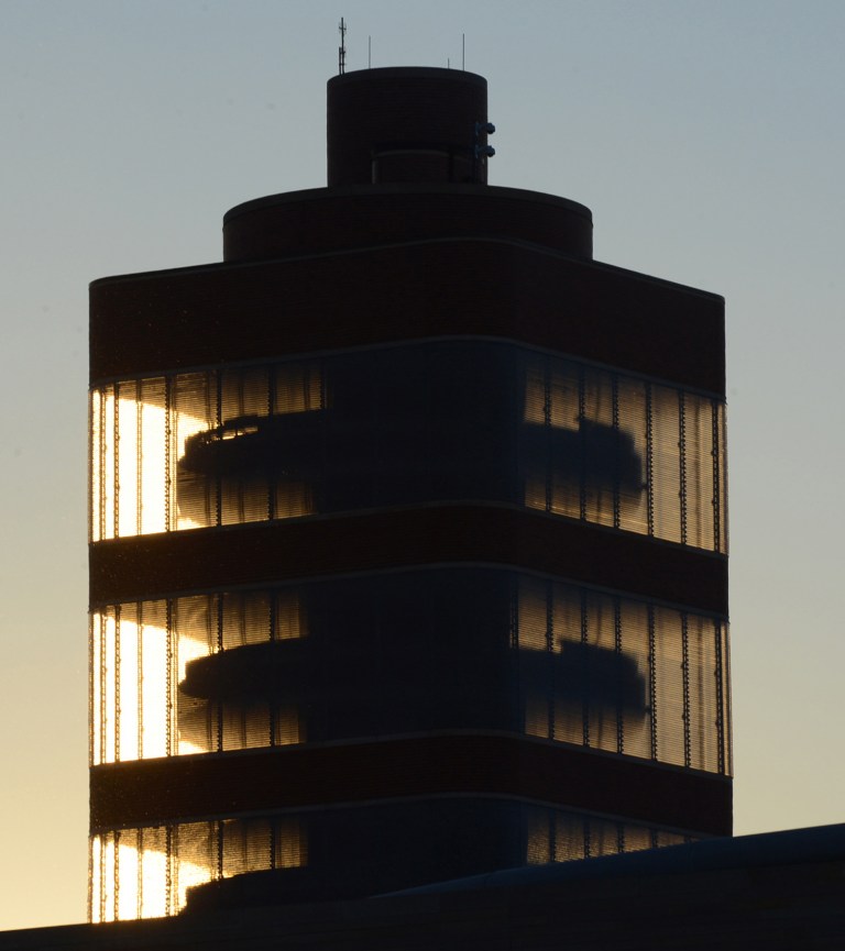 This Dec. 9, 2013 photo provided by SC Johnson shows the alternating round and square floors of the SC Johnson Research Tower designed by Frank Lloyd Wright as evening approaches in Racine, Wis. Home products giant SC Johnson is opening the building for public tours for the first time starting May 2. (AP Photo/SC Johnson, Mark Hertzberg)