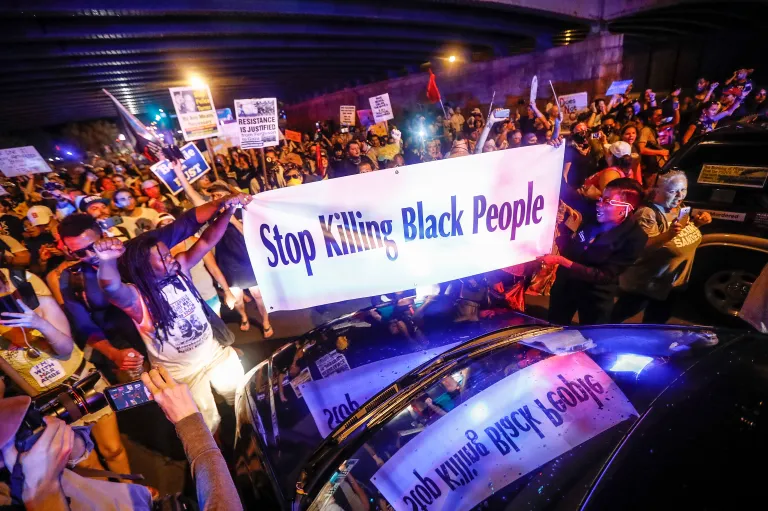 Black Lives Matter's official set of demands, released this month, seems less aimed at preserving black lives than at weakening law enforcement altogether, even at the expense of more black lives. (AP Photo/John Minchillo)