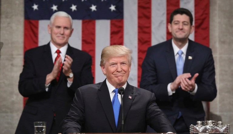 President Trump highlighted the repeal of Obamacare's individual mandate, which requires everyone buy health insurance. But he did not pledge to repeal the remainder of Obamacare in 2018 during the State of the Union on Tuesday. (Win McNamee/Pool via AP)