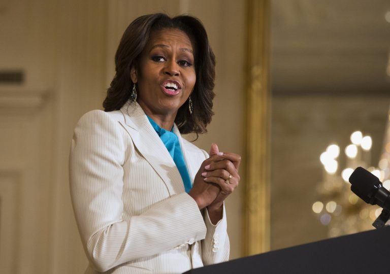 FILE - This April 11, 2104 file photo shows first lady Michelle Obama speaking in the East Room of the White House in Washington. When President Barack Obama travels abroad, getting just the leader of the free world doesnÃ?t seem to be enough. Countries want the first lady, too. But Michelle Obama wonÃ?t join her husband when he heads to Asia next week and her absence is likely to sting, especially in Japan. ItÃ?s the first of four countries on ObamaÃ?s travel schedule and the only one welcoming him on an official state visit. (AP Photo/Jacquelyn Martin, File)