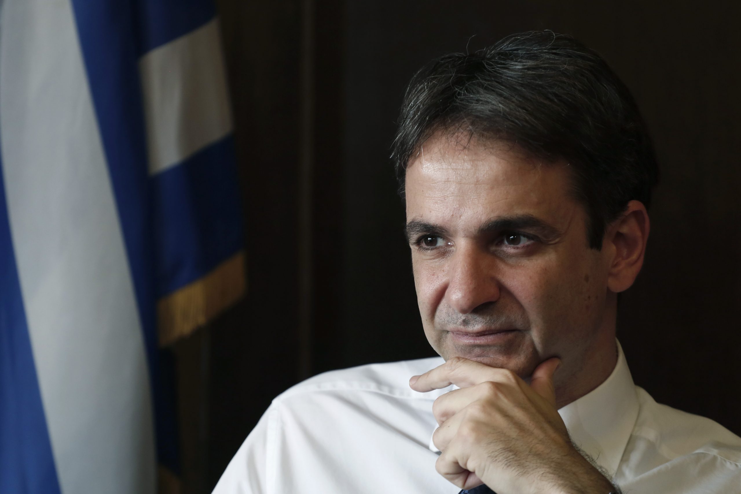 AP Interview: Greece buoyed by falling interest