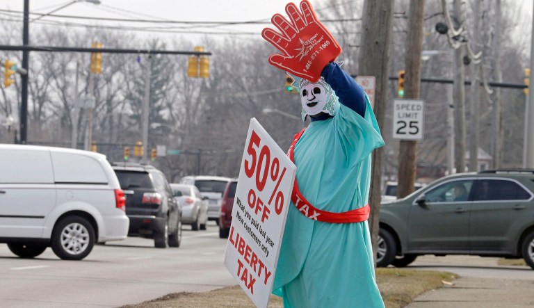 Every dollar that is spent on a tax accountant or lawyer or online tax assistant is a dollar that could otherwise be invested in the pursuit of happiness. (AP Photo/Mark Duncan)