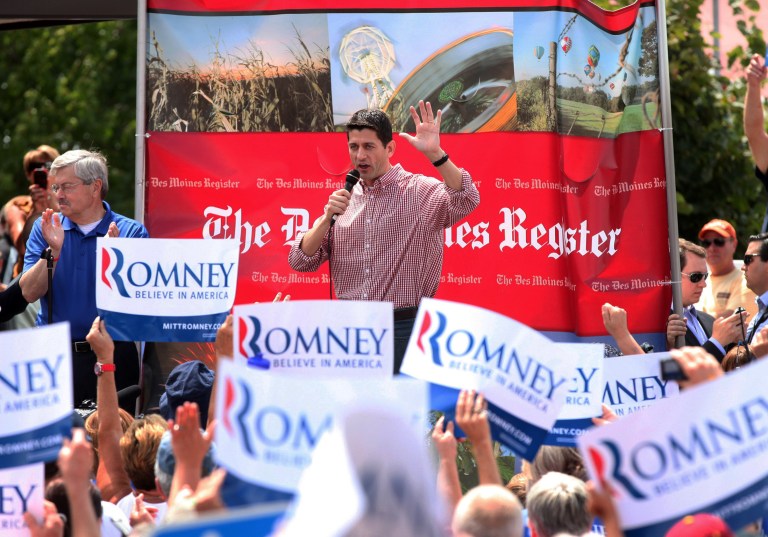 Republican Vice Presidential candidate, Rep. Paul Ryan, R-Wis., accompanied by Iowa Gov. Terry Branstad, left, speaks at the Iowa State Fair in Des Moines, Monday, Aug. 13, 2012.  (AP Photo/Conrad Schmidt)