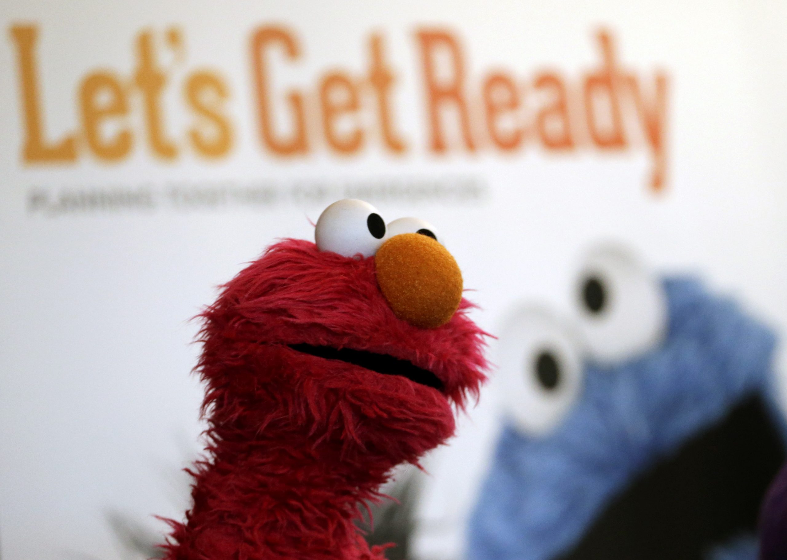 Surgeon general tells Elmo: Get vaccinated