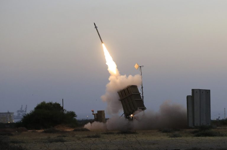 FILE - In this file photo taken July 5, 2014, an Iron Dome air defense system fires to intercept a rocket from Gaza Strip in the costal city of Ashkelon, Israel. Israel says its punishing air assault on Hamas militants, their property and their weaponry has delivered a devastating blow to the Islamic militant group. Yet rocket fire at Israel has continued almost unabated. (AP Photo/Tsafrir Abayov, File)