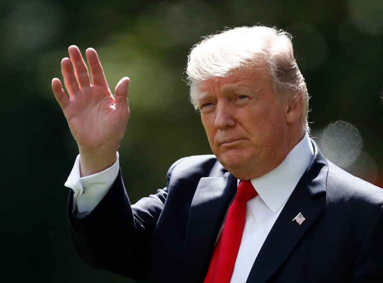 FILE - In this Sept. 15, 2017 file photo, President Donald Trump waves as he walks from the Oval Office of the White House in Washington to Marine One for the short trip to Andrews Air Force Base, Md. Facing an escalating nuclear threat from North Korea and the mass flight of minority Muslims from Myanmar, world leaders gather at the United Nations starting Monday, Sept. 18 to tackle these and other tough challenges _ from the spread of terrorism to a warming planet. The spotlight will be on Trump and France's new leader, Emmanuel Macron, who will both be making their first appearance at the General Assembly. (AP Photo/Carolyn Kaster)