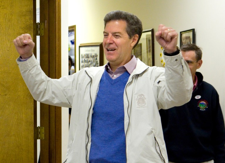 Kansas Gov. Sam Brownback visits the Kansas Republican Headquarters in Topeka, Kan. on Election Day, Tuesday. (AP Photo/Topeka Capital-Journal, Thad Allton)