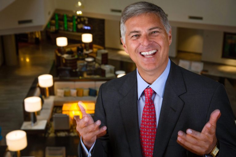 In this May 29, 2014 photo, Hilton CEO Chris Nassetta poses for a portrait in the Hilton Tysons Corner Hotel in McLean, Va. When Nassetta took over as CEO in 2007, Hilton lagged behind other hoteliers. Today, Hilton Worldwide is the largest hotelier in the world, by rooms, with 679,000 rooms. (AP Photo/J. David Ake)