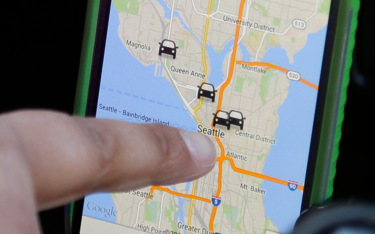 On Wednesday, the D.C. Taxicab Commission held a public hearing on its proposed regulations targeted at popular ridesharing companies including Uber, Lyft, and Sidecar. (AP Photo)
