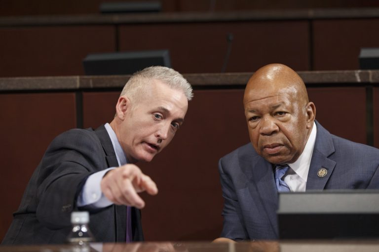 Rep. Trey Gowdy, R-S.C., chairman of the House Select Committee on Benghazi, and Rep. Elijah Cummings, D-Md., right, the ranking member, confer as the panel holds a public hearing Wednesday. (AP Photo/J. Scott Applewhite)