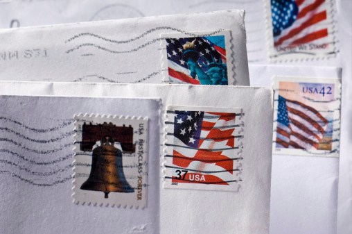 Postal service employees use travel cards to gamble, pay bills and go bowling