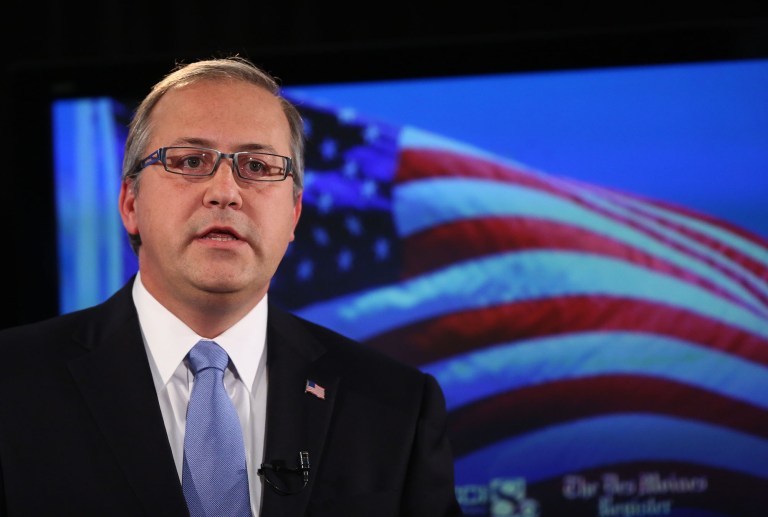 Republican David Young participates in a debate for the 3rd District race for Congress at Simpson College in Indianola, Iowa, during a debate sponsored by The Des Moines Register and KCCI-TV Oct. 6, 2014. (AP Photo/The Des Moines Register, Mary Willie)