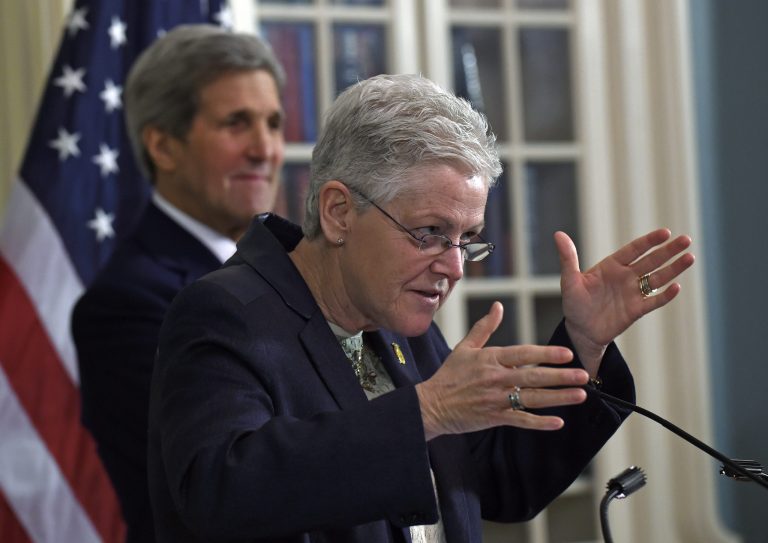 Environmental Protection Agency (EPA) Administrator Gina McCarthy, right, accompanied by Secretary of State John Kerry speaks at the State Department in Washington, Wednesday, Feb. 18, 2015, during a signing ceremony to launch a joint air quality program at select U.S. diplomatic missions overseas. (AP Photo/Susan Walsh)