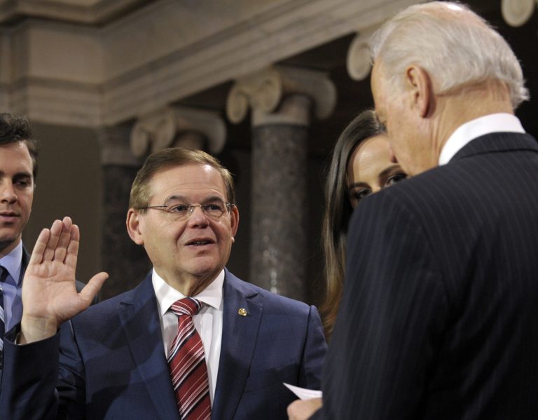 Vice President Joe Biden administers the Senate Oath to Sen. Robert Menendez, D-N.J. during a mock swearing in ceremony on Capitol Hill. (AP Photo/Cliff Owen)