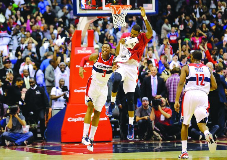 Alex Brandon/AP
Wizards rookie guard Bradley Beal (3) hit a one-handed shot with 0.3 seconds left to beat the Thunder on Monday night.