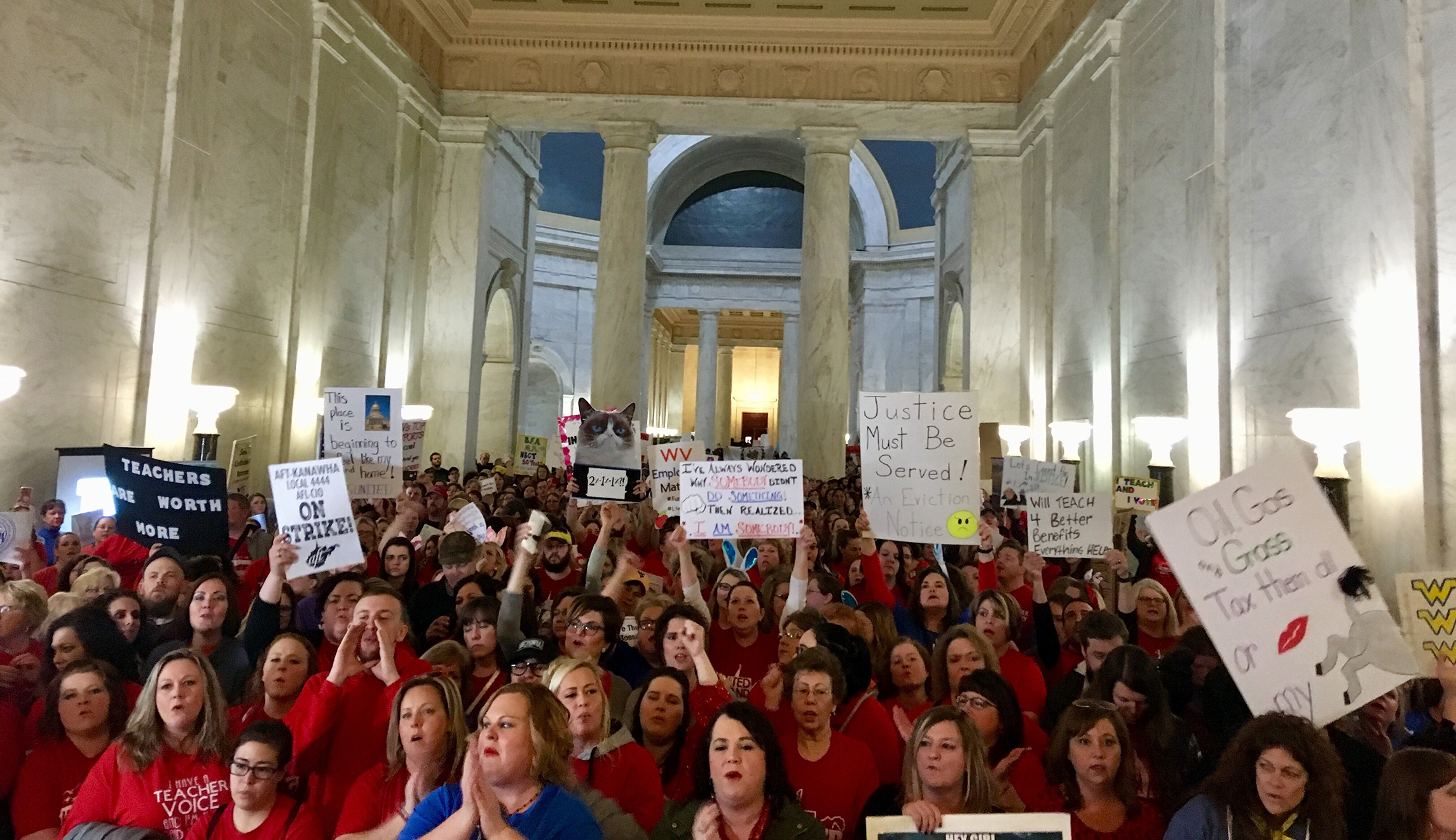 West Virginia public school teachers stage walkout over meager raises