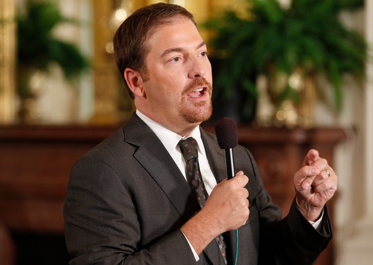 Chuck Todd, chief White House correspondent for NBC News, speaks on camera before President Barack Obama and British Prime Minister David Cameron hold a joint news conference in the East Room of the White House in Washington, Tuesday, July 20, 2010. (AP Photo/Charles Dharapak)