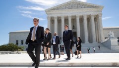 Supreme Court drops one of two cases challenging Trump’s travel ban