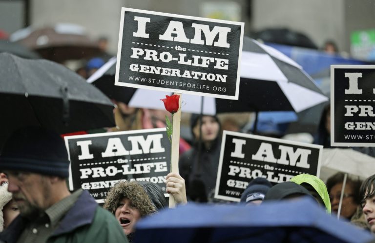 Anti-abortion leaders speaking Thursday at the first-ever Evangelicals for Life conference in Washington tried to strike a very different tone from the movement's past, and from how some Republicans have sounded on the campaign trail lately. (AP Photo)