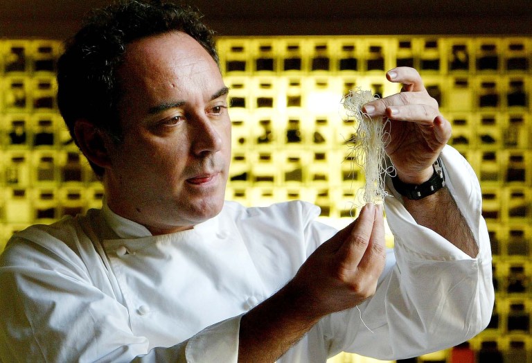   FILE - In this Dec. 5, 2003 file photo, Spanish chef Ferran Adria examines ingredients in his kitchen workshop in Barcelona, Spain. Spainâs famed chef Ferran Adria says the wine cellar of his former restaurant, elBulli is to be auctioned to raise funds for his new project, the elBulli Foundation. (AP Photo/Bernat Armangue, File)  