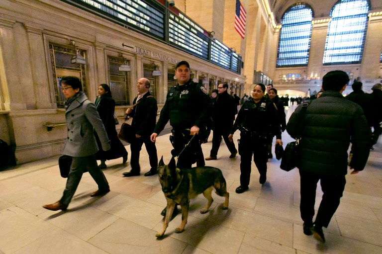 Metro-North Railroad police officers patrol Grand Central Terminal, in New York, Tuesday, March 22, 2016. One analyst says an attack on America isn't necessarily coming because of actions the U.S. has taken since Sept. 11 to keep Americans safe. (AP Photo/Richard Drew)