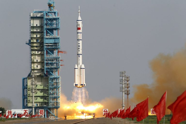   Shenzhou 9 spacecraft rocket launches from the Jiuquan Satellite Launch Center in Jiuquan, China, Saturday, June 16, 2012. China sent its first woman and two other astronauts into space Saturday to work on a temporary space station for about a week, in a key step toward becoming only the third nation to set up a permanent base in orbit. (AP Photo/Ng Han Guan)  