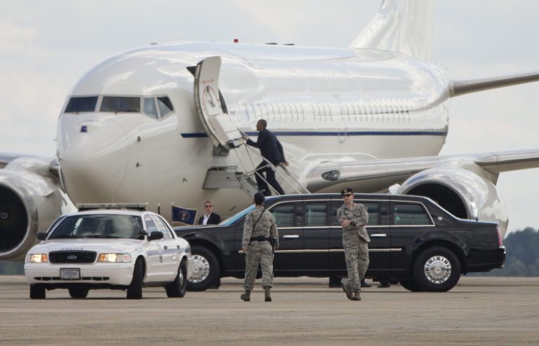 President Barack Obama walks up the stairs to visit first lady Michelle Obama who was aboard the plane, Wednesday, Sept. 17, 2014 at Andrews Air Force Base, Md. Obama, who had just returned on Air Force One from a trip to US Central Command in Tampa, Fla., drove the short distance in his motorcade. The first lady's office says her visit to St. Jude Children's Research Hospital in Memphis, Tenn., was delayed because of a maintenance issue with the airplane she was assigned. (AP Photo/Pablo Martinez Monsivais)
