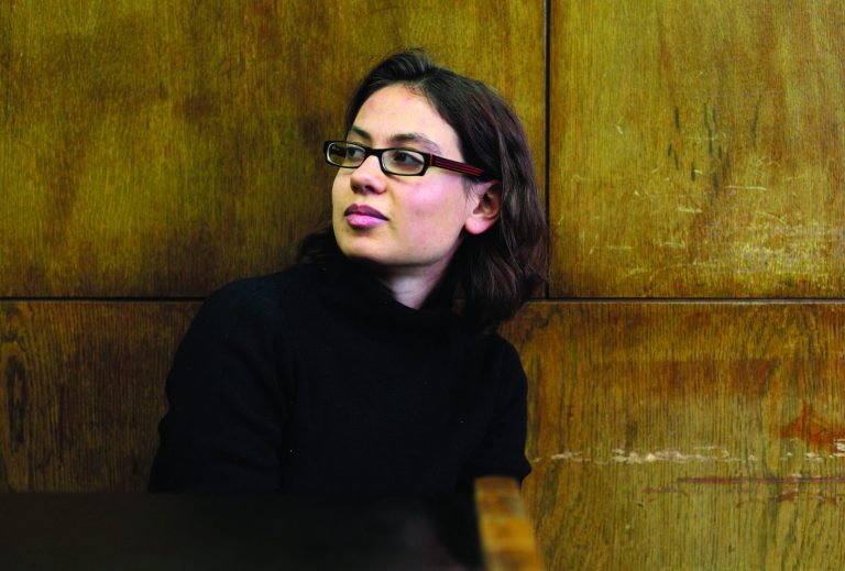 FILE - In this Tuesday, Jan. 26, 2010 file photo, former Israeli soldier Anat Kamm attends a court hearing in Tel Aviv, Israel. Israel's military censor, which has long served as the country's guardian of state secrets, is suddenly under the microscope following a pair of sensitive reports broken by the international media. In 2010, a court-ordered ban prevented local reporting of the case of Anat Kamm, a former female soldier charged with leaking more than 2,000 military documents to a newspaper. The case was reported extensively in blogs and foreign press, which Israeli media were initially forced to cite before the gag order was lifted. (AP Photos/David Bachar, File) **ISRAEL OUT**