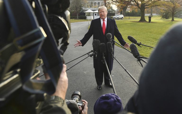 President Donald Trump speaks to reporters on the South Lawn of the White House in Washington, Monday, Dec. 4, 2017, before heading to Utah. (AP Photo/Susan Walsh)