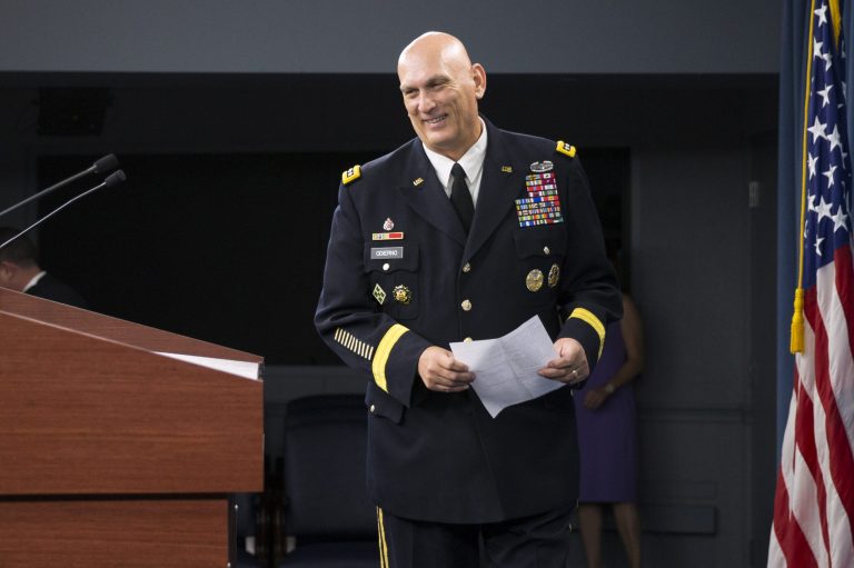 Outgoing Army Chief of Staff Gen. Ray Odierno arrives to speak at his final news briefing, Wednesday, Aug. 12, 2015, at the Pentagon. (AP Photo/Evan Vucci)
