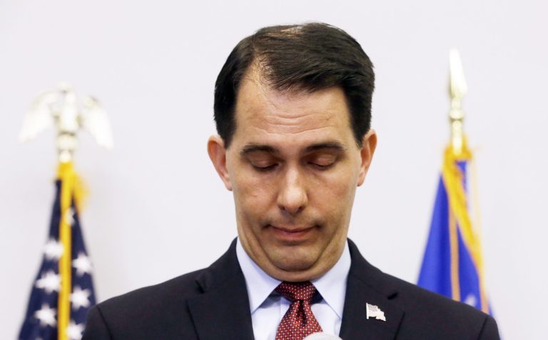 Wisconsin Gov. Scott Walker pauses as he speaks at a news conference Monday, in Madison, Wis., where he announced that he is suspending his Republican presidential campaign. (AP Photo/Morry Gash)