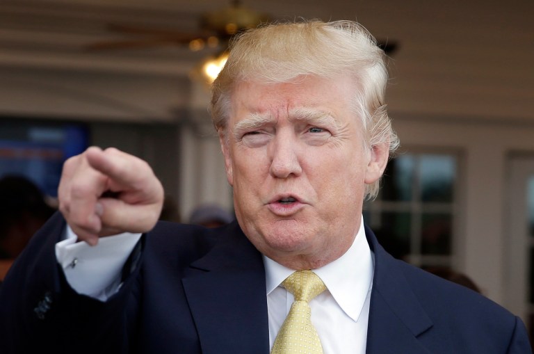 In this July 6, 2015, file photo, Republican presidential candidate Donald Trump arrives to a fundraising event at a golf course in the Bronx borough of New York. (AP Photo/Seth Wenig, File)