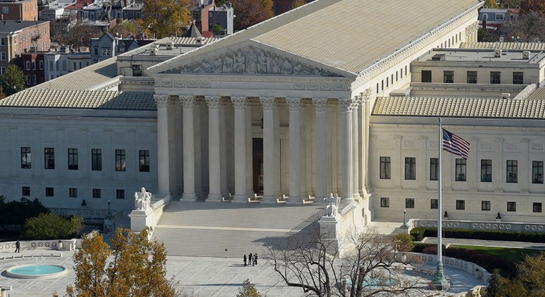Perhaps gradually expanding the number of justices on the Supreme Court would help ensure we don't end up in another election year where the Supreme Court is a political football. (AP Photo/Susan Walsh)