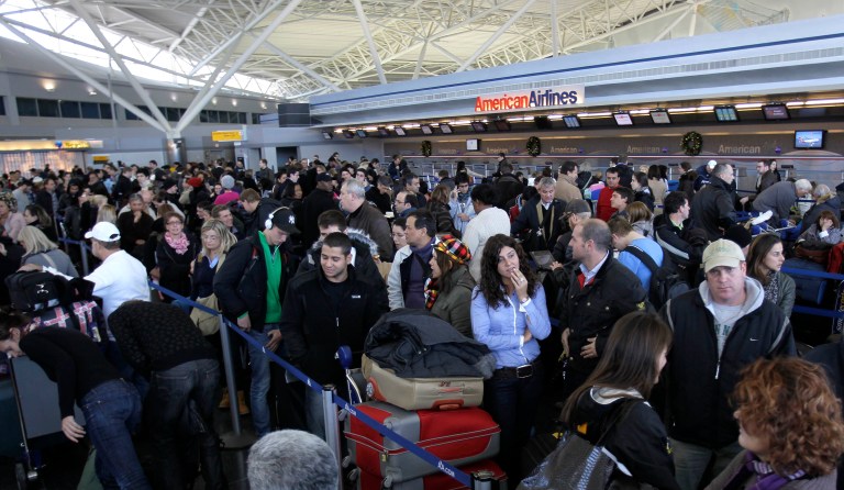 On the same day President Trump signed an executive order that temporarily bars refugees from entering the U.S., two Iraqi refugees were detained at John F. Kennedy Airport, according to a report. (AP Photo/Seth Wenig)