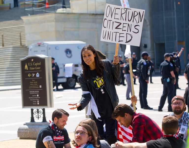 Actress Rosario Dawson takes part in a demonstration by the group Democracy Spring on Capitol Hill. (AP Photo/Pablo Martinez Monsivais)