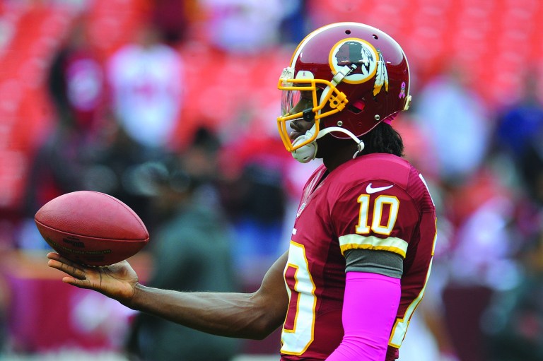 Richard Lipski/AP
Washington Redskins quarterback Robert Griffin III was a full participant in practice Friday after suffering a concussion in last Sunday's game. 