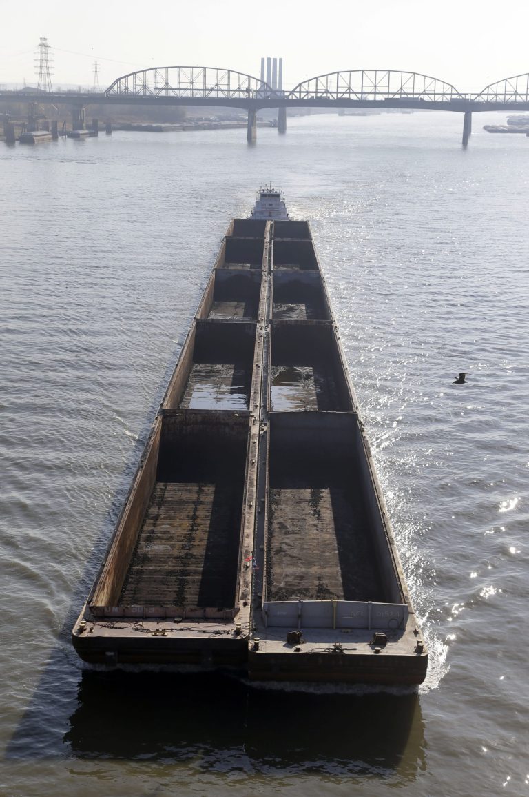   FILE - In this Nov. 16, 2012 file photo, a barge powers its way up the Mississippi River in St. Louis. According to Coast Guard officials Thursday, Dec. 27, 2012, the Mississippi River level is dropping again and could get so low as early as next week that some barge operators will stop operating. But a Guard official remains confident that the nation's largest waterway will remain open to traffic despite the worst drought in decades. (AP Photo/Jeff Roberson, File)  