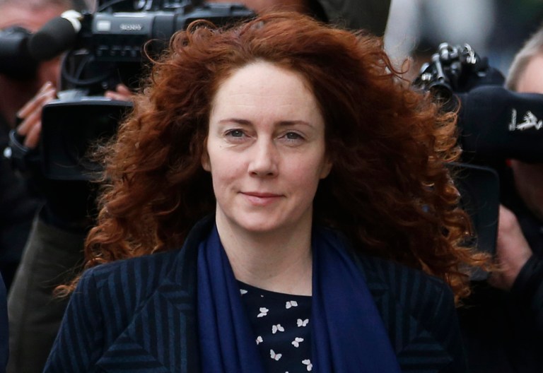 FILE - This is a Wednesday, Feb. 19, 2014 file photo of Rebekah Brooks, the former News International chief executive, arrives at the Central Criminal Court in London to face charges related to phone hacking. A judge has told jurors that the fate of Britain's phone-hacking defendants will soon be in their hands, and they must banish sentiment and emotion when considering their verdicts. Judge John Saunders began summing up Wednesday, June 4, 2014,  at the trial of former News of the World editors Rebekah Brooks and Andy Coulson, and five others, over wrongdoing at Rupert Murdoch's British newspapers. All the defendants deny the charges. (AP Photo/Sang Tan, File)