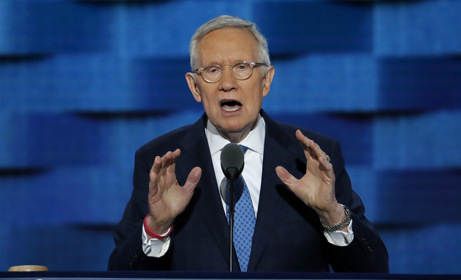 In final DNC farewell, Reid blames McConnell, GOP for Trump