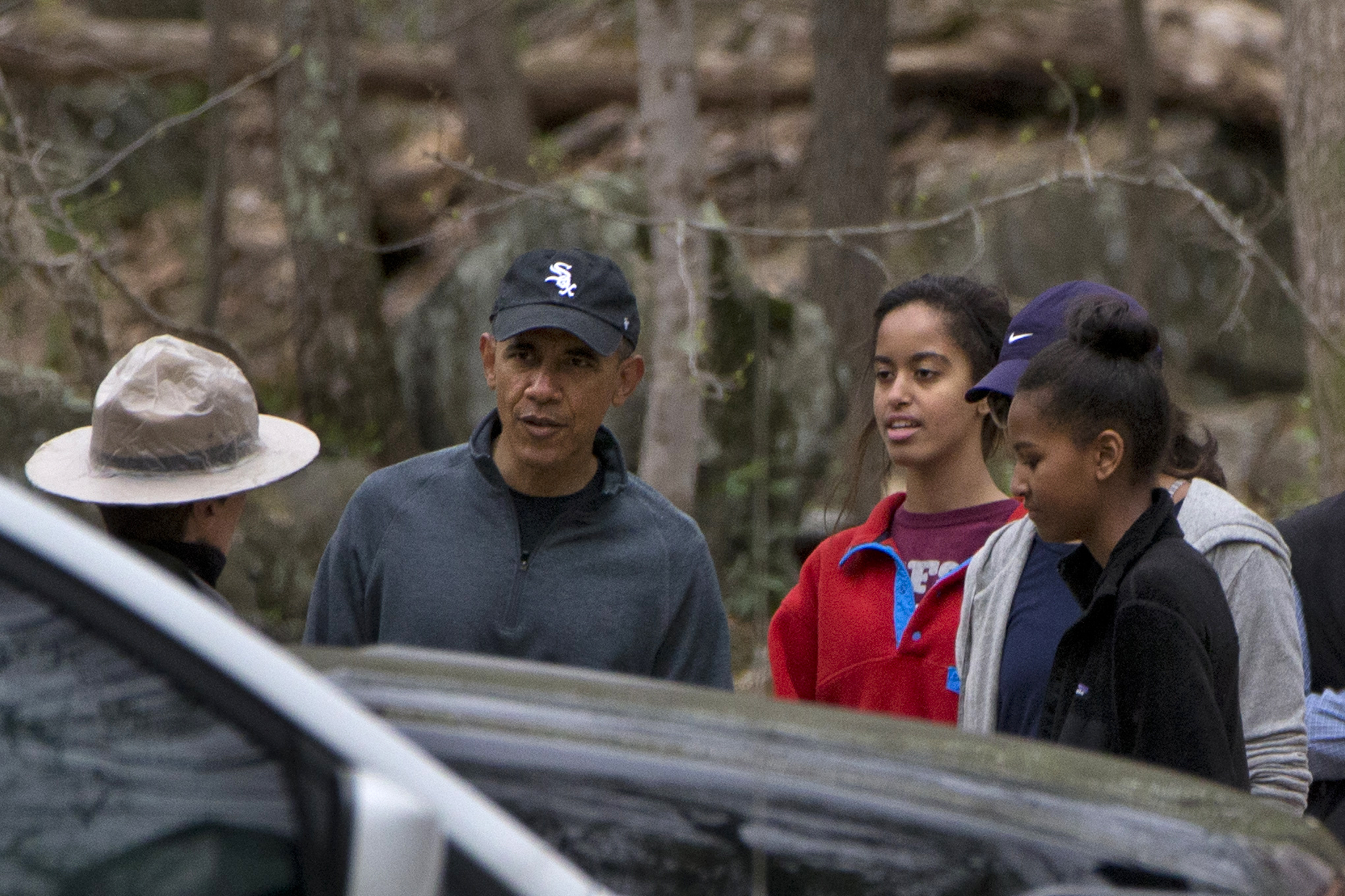 Obama takes pre-Christmas hike with daughters
