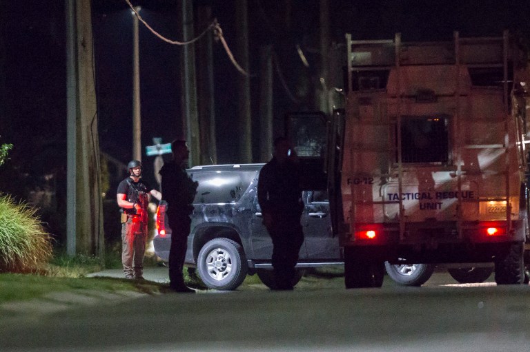 Police stormed the Strathroy, Ontario, residence of Aaron Driver after receiving a tip that the suspect was plotting an attack later that day. (Geoff Robins/The Canadian Press via AP)