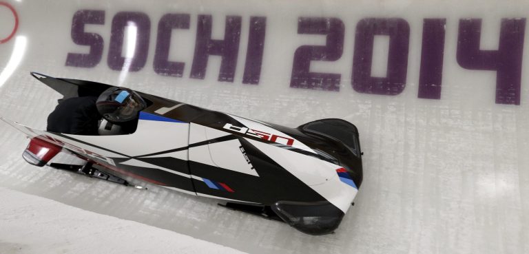 Jamie Greubel and Aja Evans of the United States take a turn during a training session for the women's bobsleigh at the 2014 Winter Olympics,  Friday, Feb. 14, 2014, in Krasnaya Polyana, Russia. (AP Photo/Michael Sohn)
