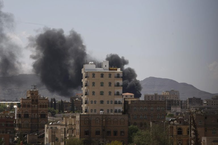 Smokes rises from an area due to clashes between Sunni militiamen and Hawthi Shiite rebels in Sanaa, Yemen, Sunday, Sept. 21, 2014. Yemen's top security body imposed an overnight curfew in restive areas of the capital, Sanaa, on Saturday after Shiite rebels took over the state television building amid heavy clashes and the U.N. envoy to the country signaled that a deal had been reached to end the violence. (AP Photo/Hani Mohammed)