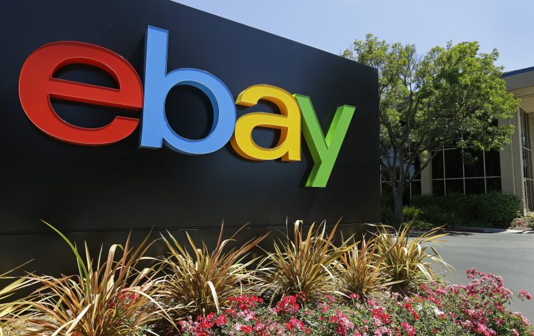 FILE - This Tuesday, July 16, 2013 file photo shows a sign at eBay headquarters in San Jose, Calif. The e-commerce site on Monday, Oct. 13, 2014 kicks off its 