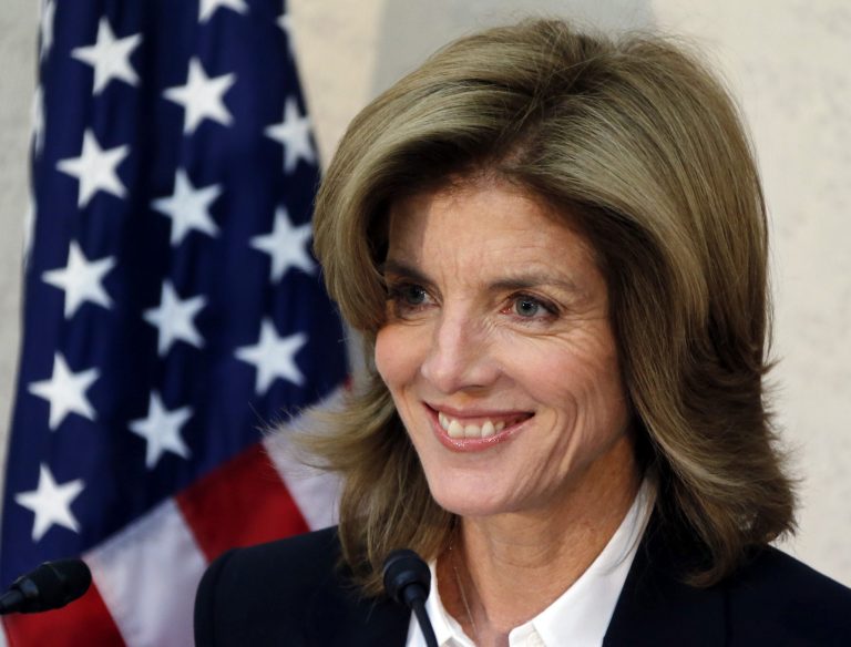 FILE - In this Nov. 15, 2013 file photo, new U.S. Ambassador to Japan Caroline Kennedy smiles as she gives a statement upon her arrival in Japan at the Narita International Airport in Narita, east of Tokyo. The daughter of President John F. Kennedy says his spirit lives on even though his life was cut short. Caroline Kennedy said in an interview with Japan's Yomiuri newspaper that she often meets people who tell her they were inspired by her father. She said it's a reminder that we all have a duty to work together for a better world. (AP Photo/Koji Sasahara, Pool, File)