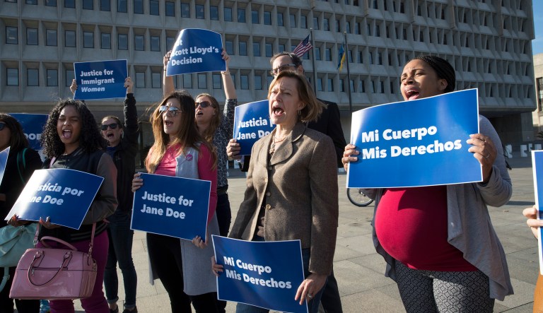Activists demonstrate in support of a pregnant 17-year-old being held for unaccompanied immigrant children to obtain an abortion. (AP Photo/J. Scott Applewhite)