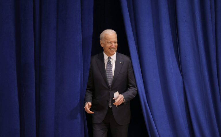 Vice President Joe Biden reacts as he enters the auditorium before speaking about the economy and the Obama administration's policies, Thursday, Feb. 12, 2015, at Drake University in Des Moines, Iowa. (AP Photo/Charlie Neibergall)