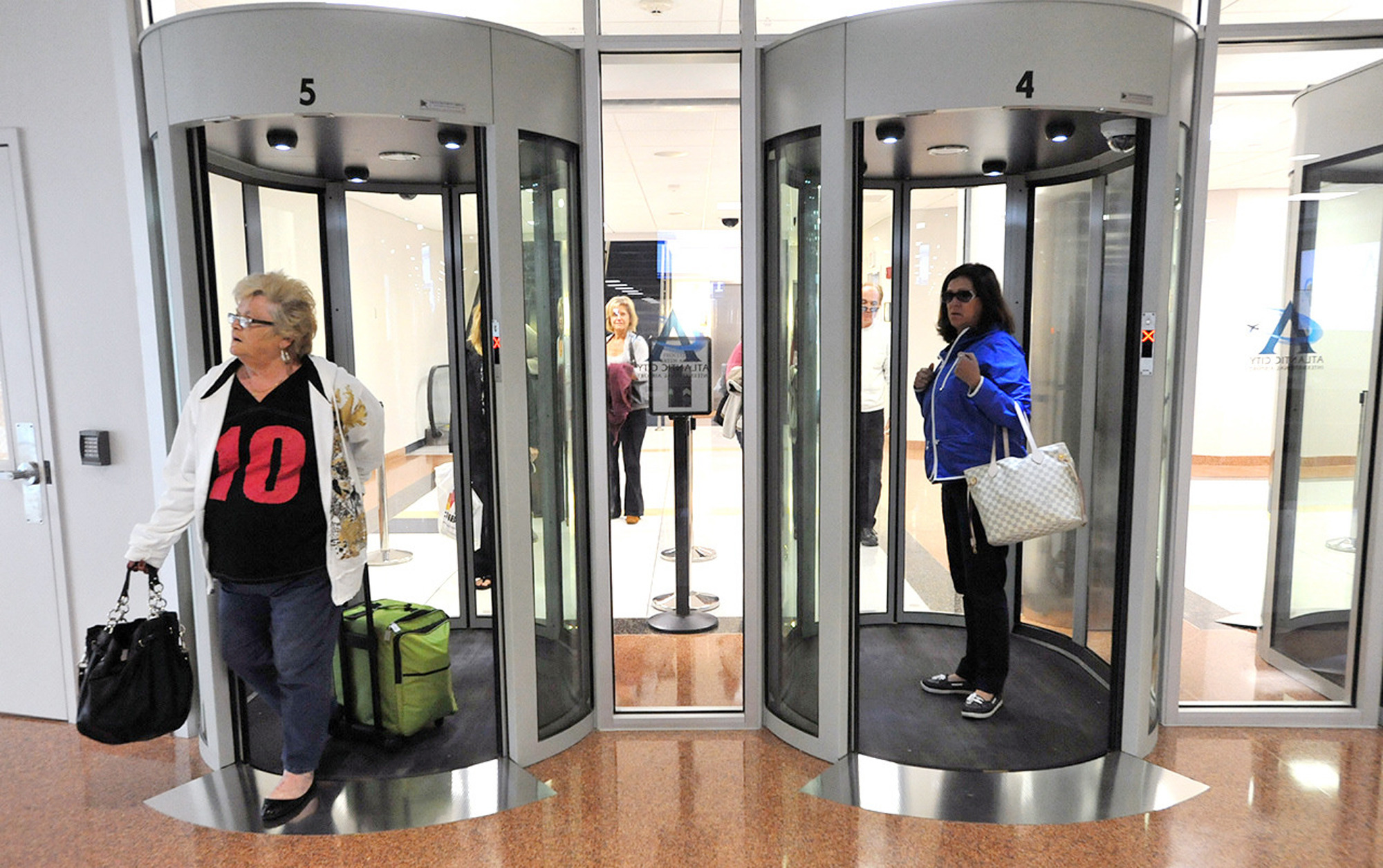 Glass exit portals: Security to leave the airport